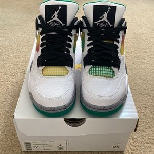 Woman’s Air Jordan 4 Retro white/black/lucid-green